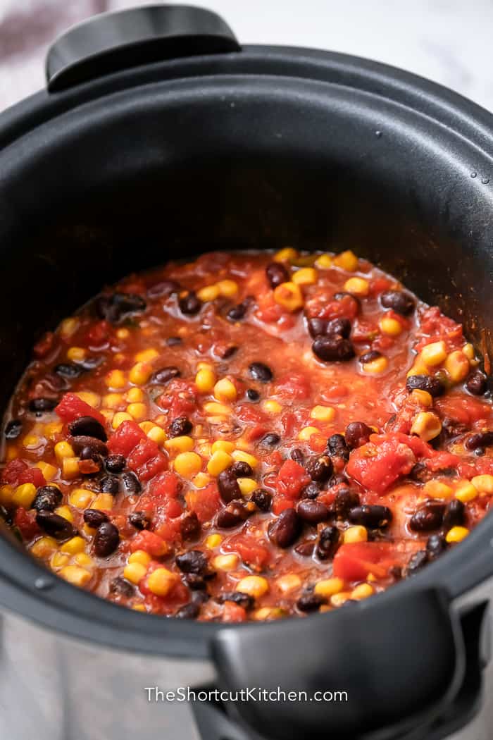 ingredients for Crockpot shredded chicken tacos in a Crockpot