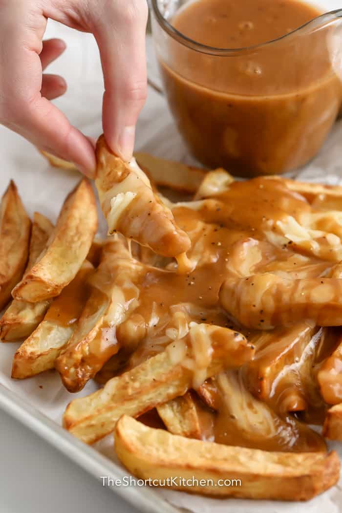 tray of finished disco fries with cheese