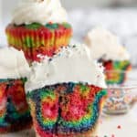 group of rainbow coloured cupcakes