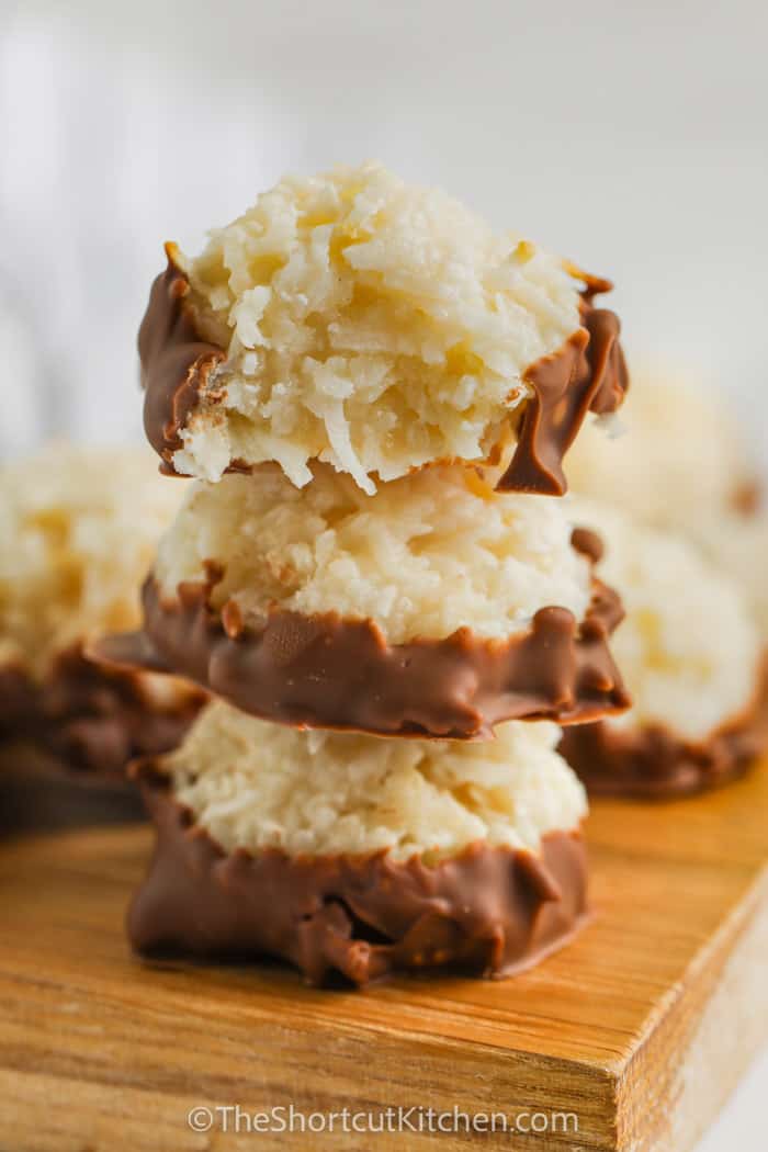 stack of Coconut Macaroons with a bite taken out of one