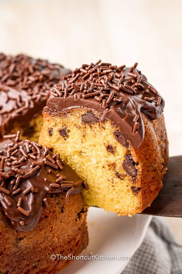 Chocolate Chip Bundt Cake with slice being removed