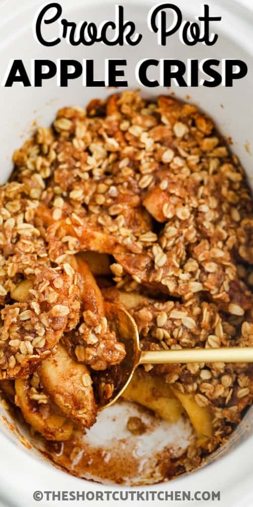 A crock pot full of apple crisp with text