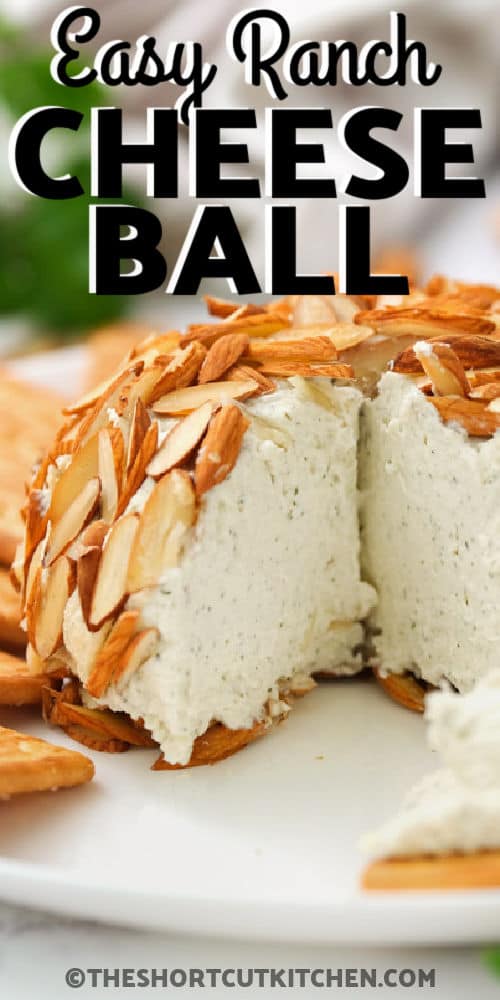 Parmesan Ranch Cheeseball with a piece taken out with a title