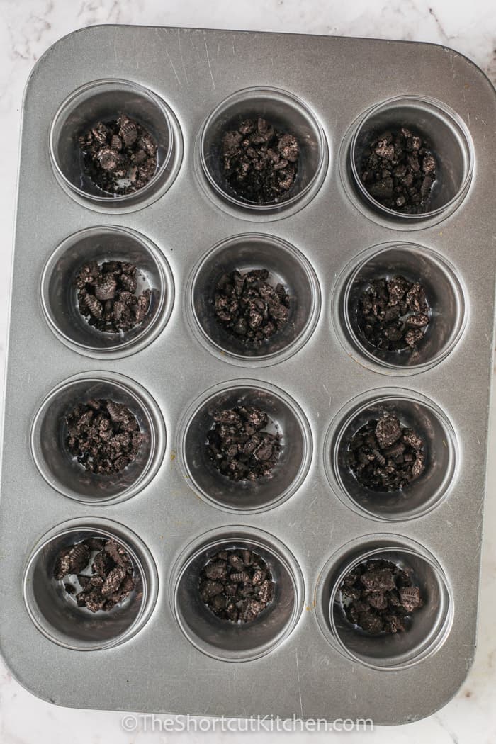 cookie crumbs in cups and in a muffin tin