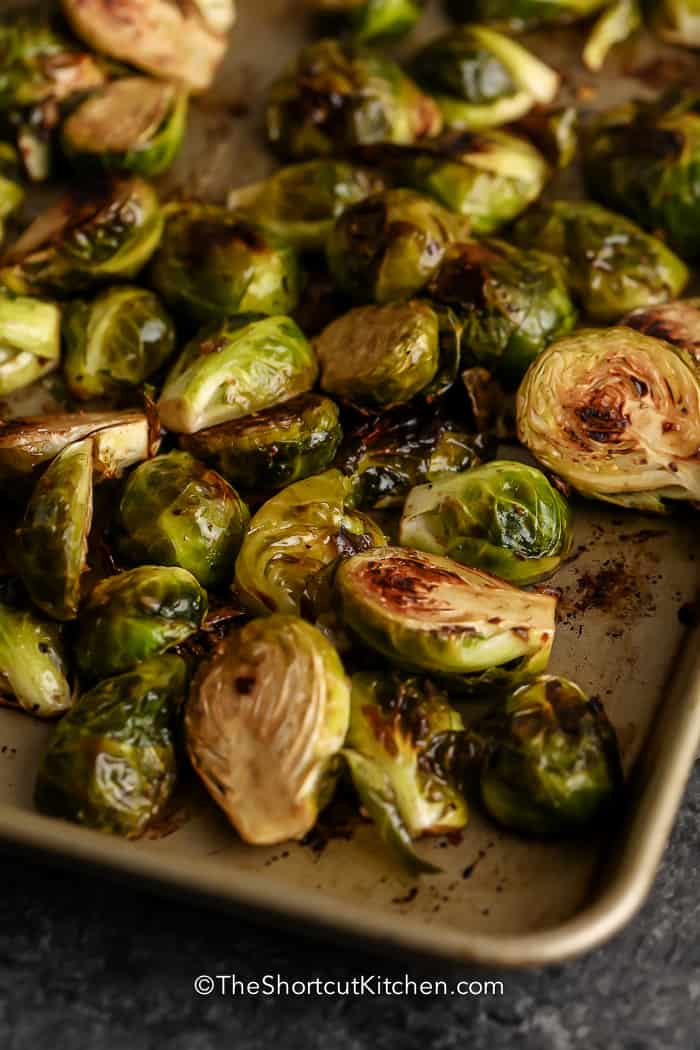 Close up of Roasted Brussel Sprouts with Balsamic Vinegar on a baking tray