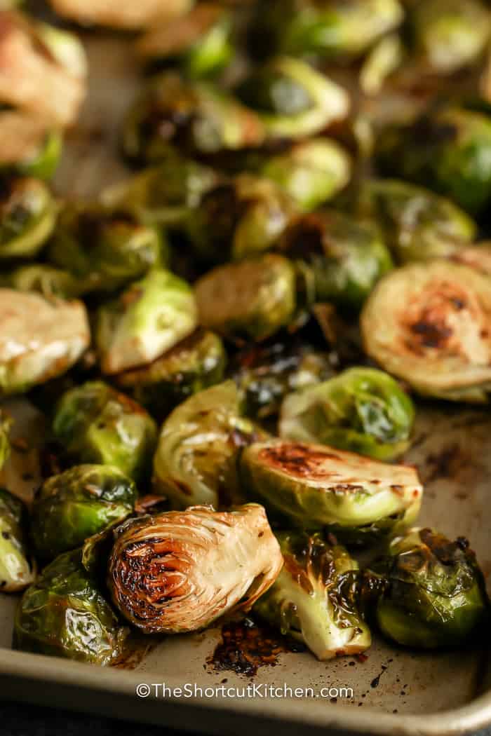 Roasted Brussel Sprouts with Balsamic Vinegar on a baking sheet