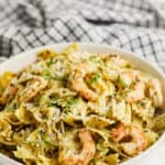 plated Shrimp Pesto Pasta with napkin in the back