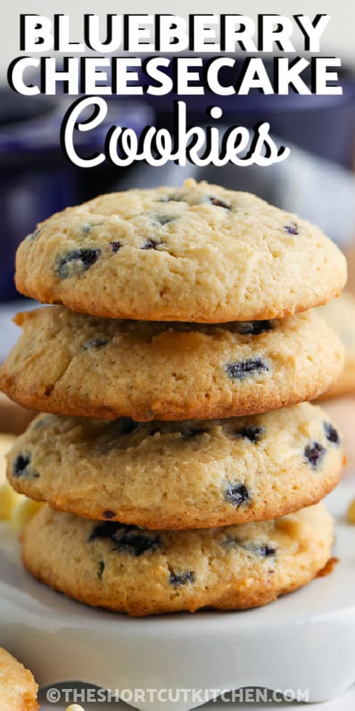 Four Blueberry Cheesecake Cookies stacked with writing