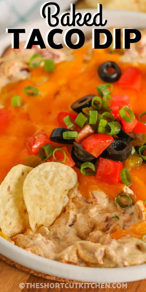 close up of Easy Taco Dip with chips and writing