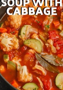 cooked Vegetable Soup With Cabbage in the pot with writing