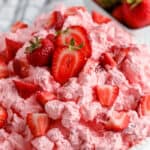 A serving dish full of strawberry fluff salad