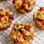 Close up of Cranberry Stuffing Muffins on a cooling rack