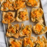 top view of cooked Green Bean Bites on a baking sheet