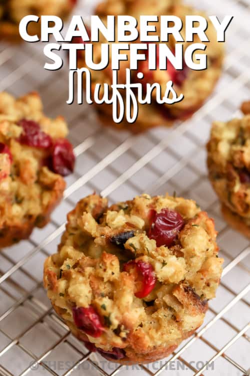 Cranberry Stuffing Muffin on cooling rack with writing
