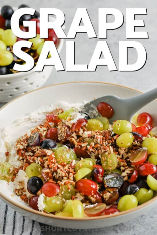 mixing Easy Grape Salad with a title