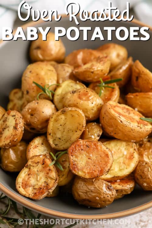 baked Rosemary Roasted Potatoes in a bowl with writing