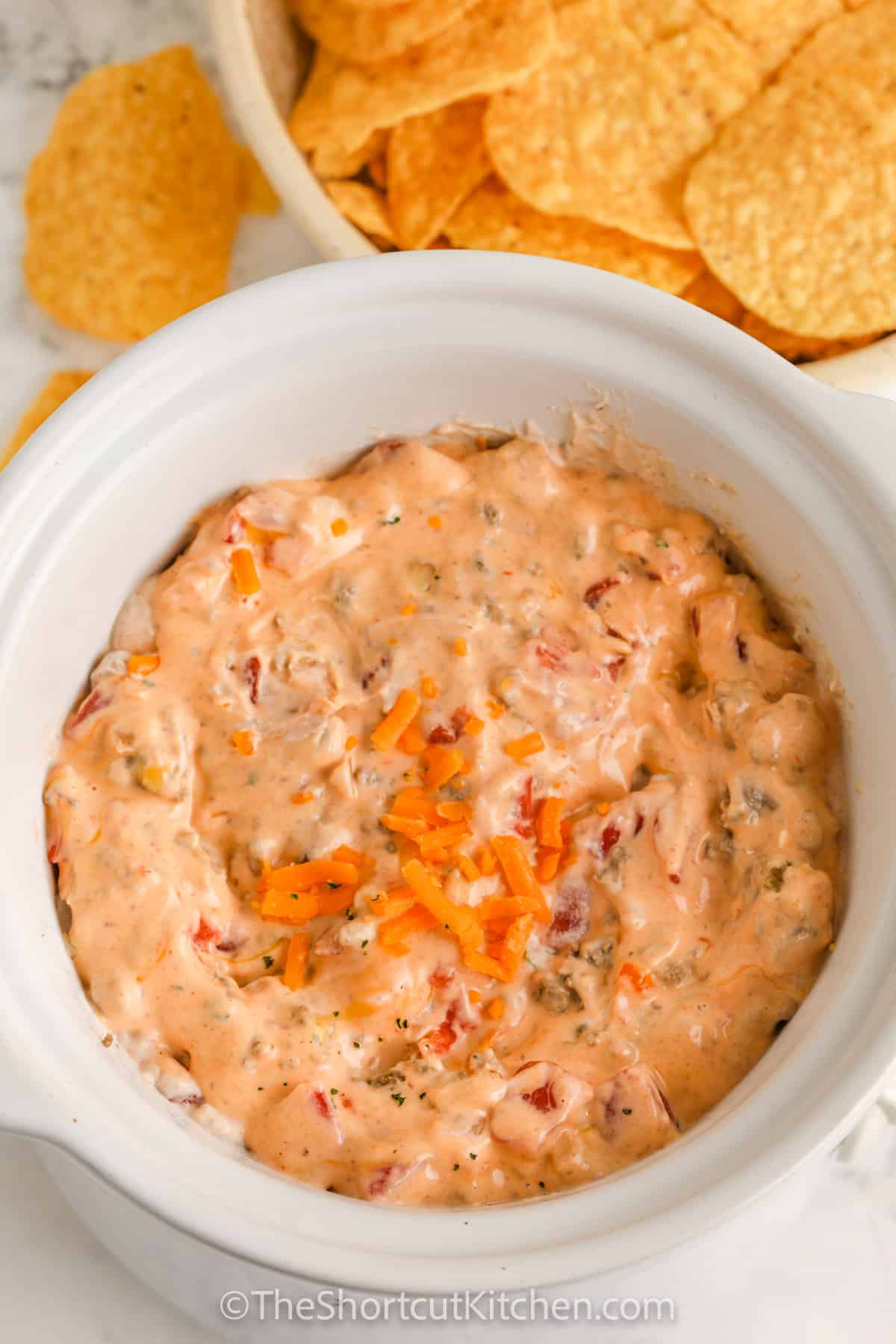 Cream Cheese Rotel Dip Recipe in a bowl with chips