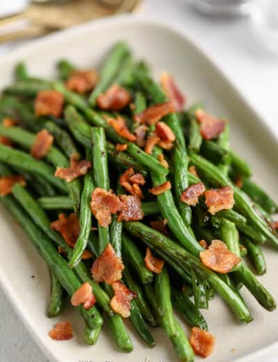 A serving tray with Air Fryer Green Beans and Bacon