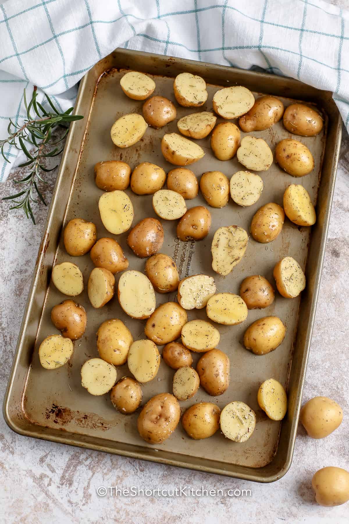 Rosemary Roasted Potatoes on a baking sheet before cooking