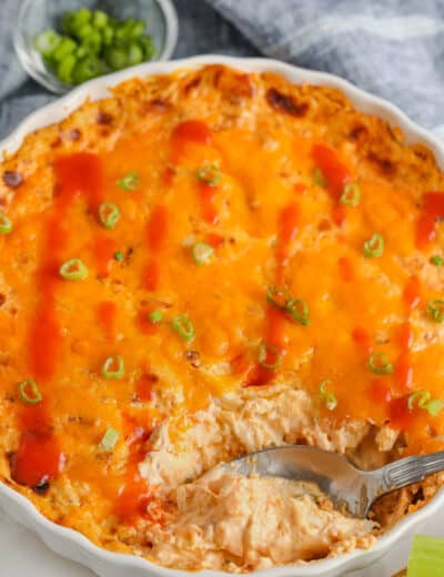 plated Buffalo Ranch Chicken Dip with hot sauce
