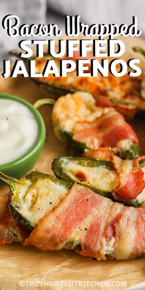 a plate of Bacon Wrapped Stuffed Jalapenos with writing