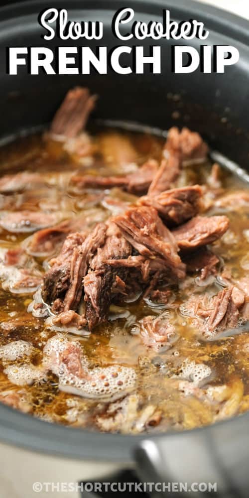 cooked beef to make Crock Pot French Dip Recipe with writing