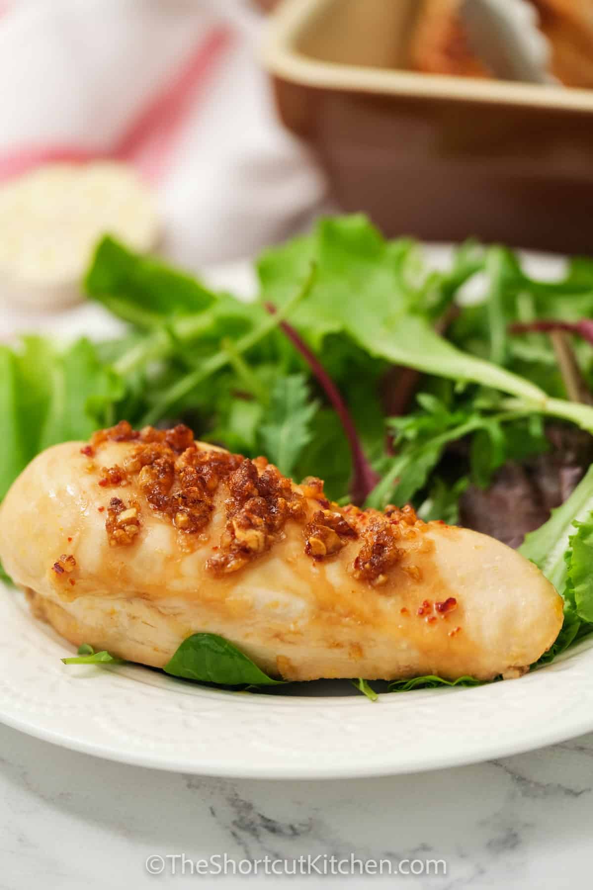 plated Sweet Garlic Chicken Recipe with salad