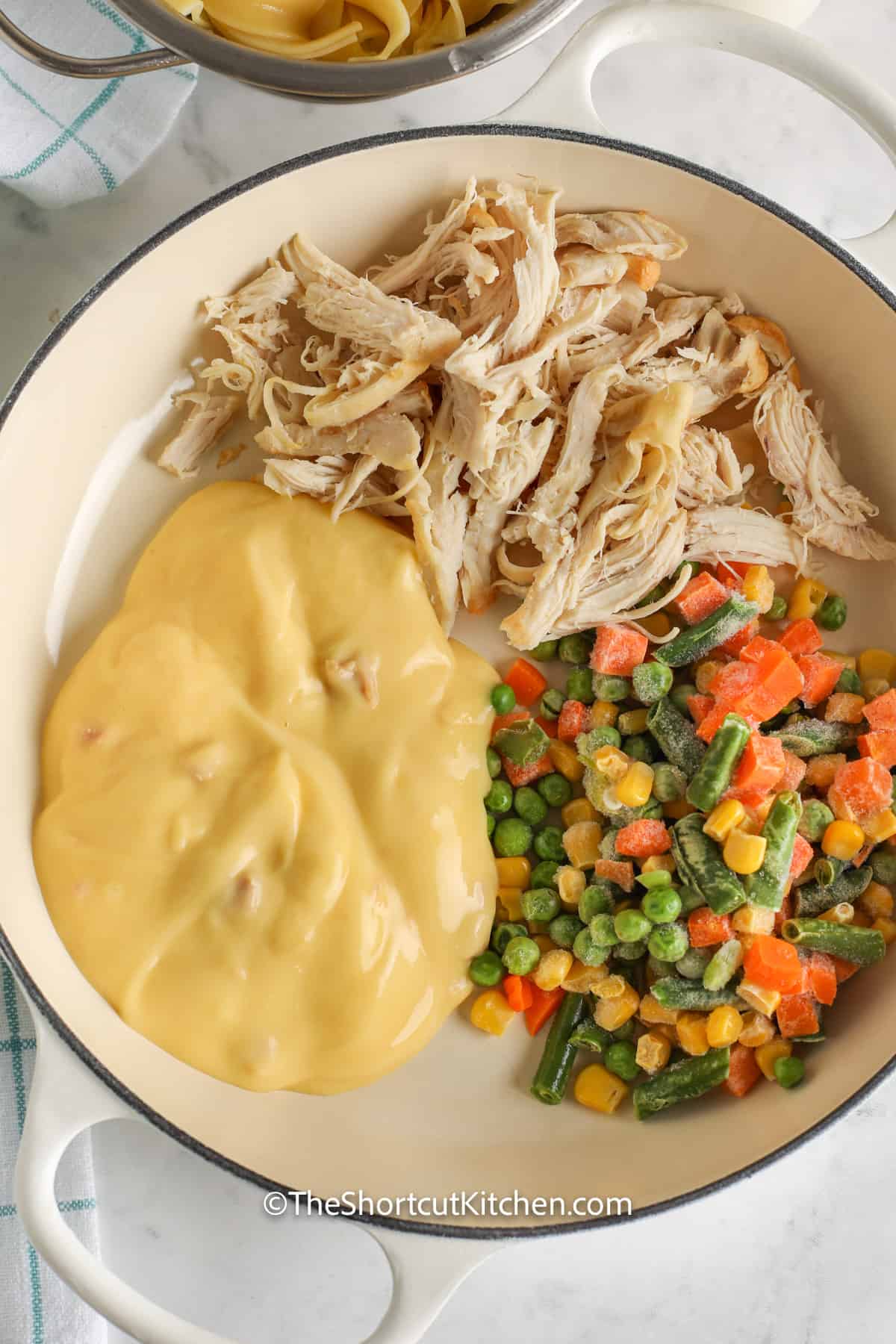 Chicken and Egg Noodles Ingredients combined in a pot