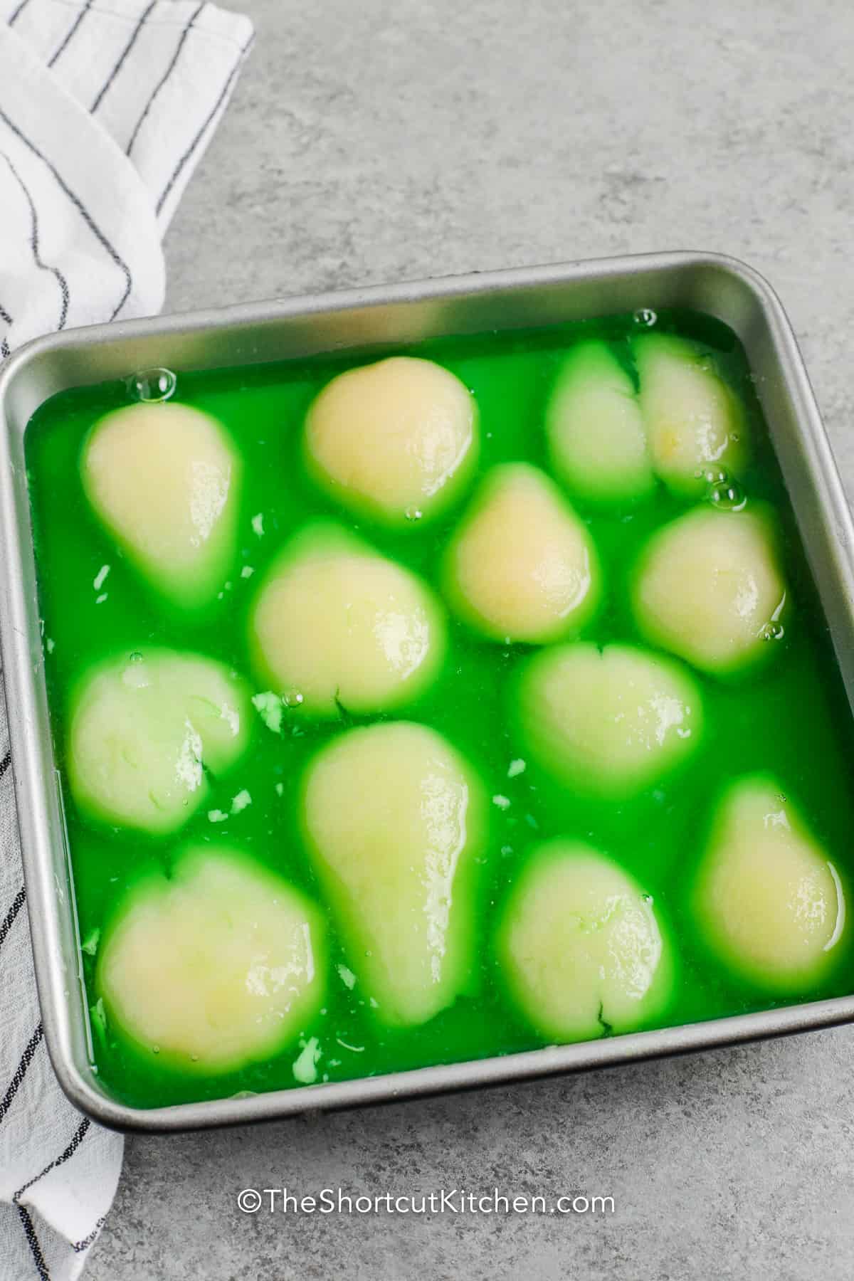 Lime jello salad prepared in a pan
