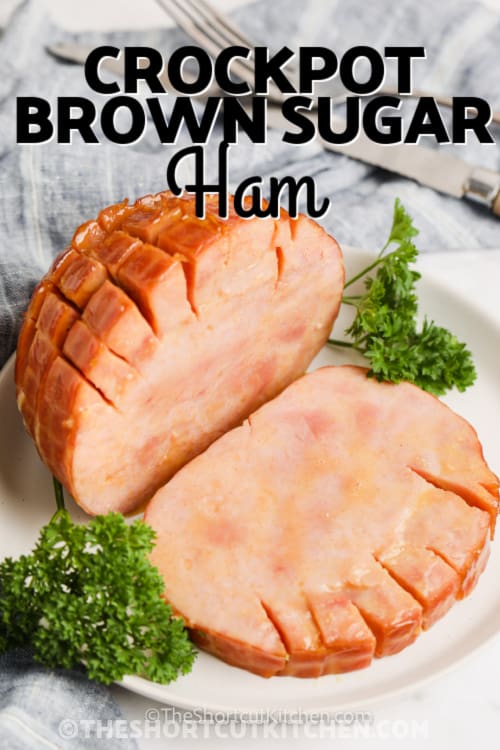 Crockpot Brown Sugar Ham on a plate with parsley with text
