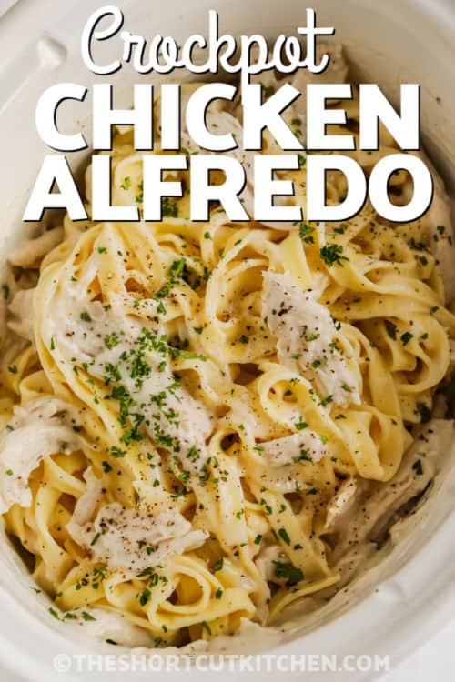 Crockpot Chicken Alfredo cooked in the pot with writing