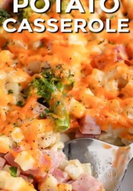 Ham & Potato Casserole in a dish with a scoop being taken out with a title