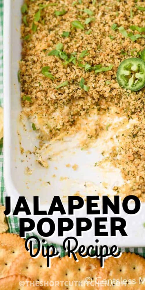 A casserole of Jalapeno Popper Dip with writing