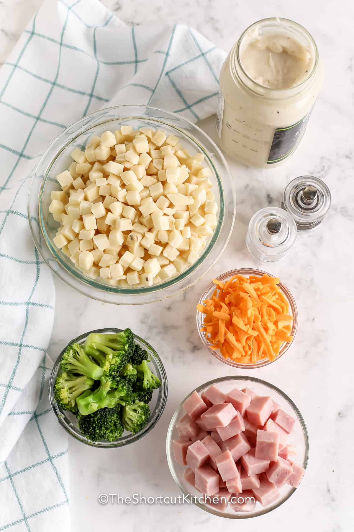 Ham & Potato Casserole ingredients on a marble board