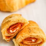 A pepperoni pizza roll sliced in half