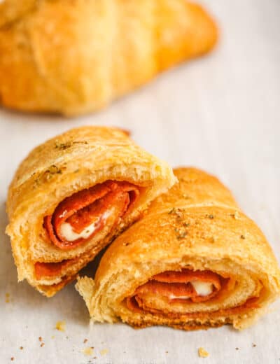 A pepperoni pizza roll sliced in half