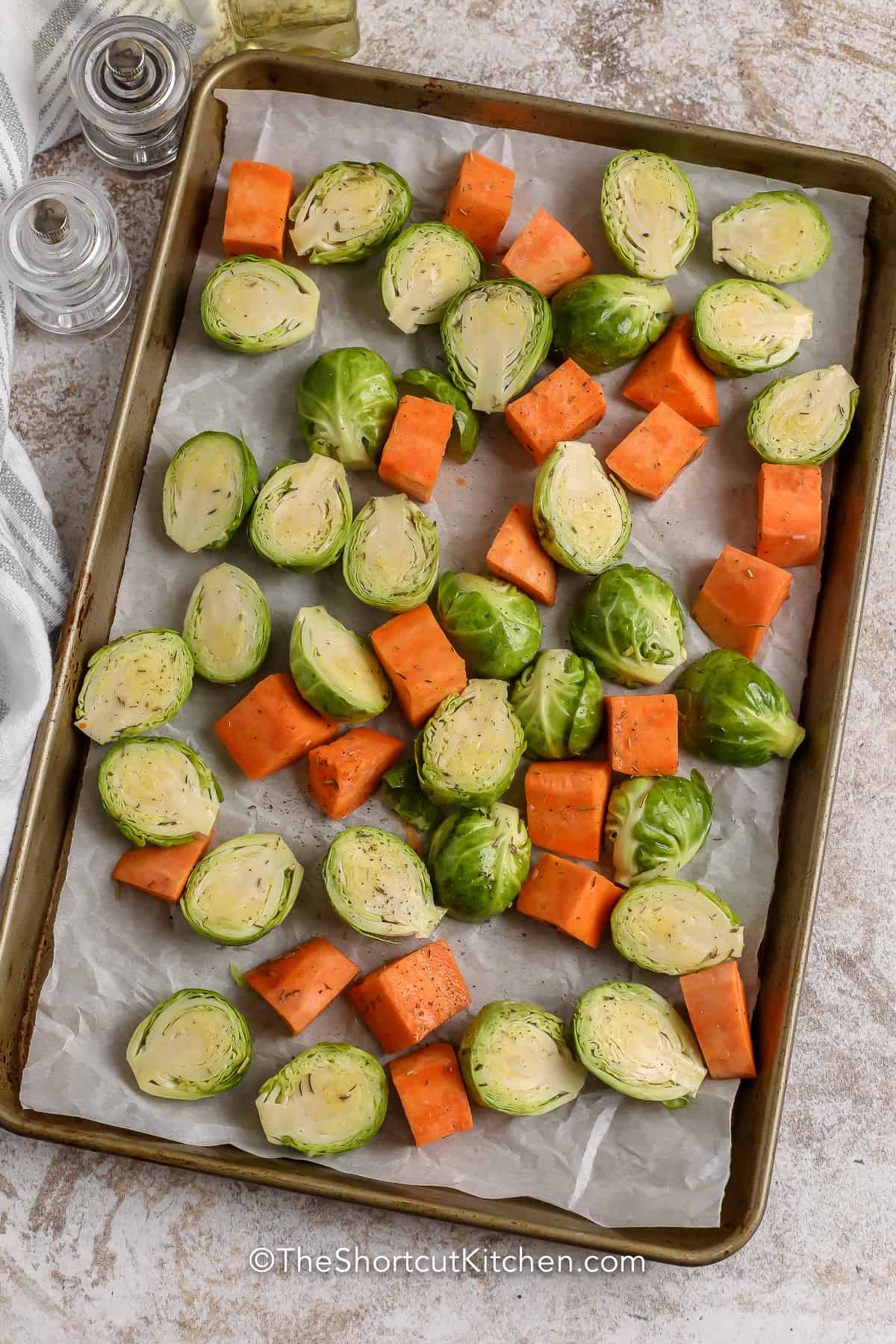 raw vegetables for Roasted Vegetables on a sheet pan