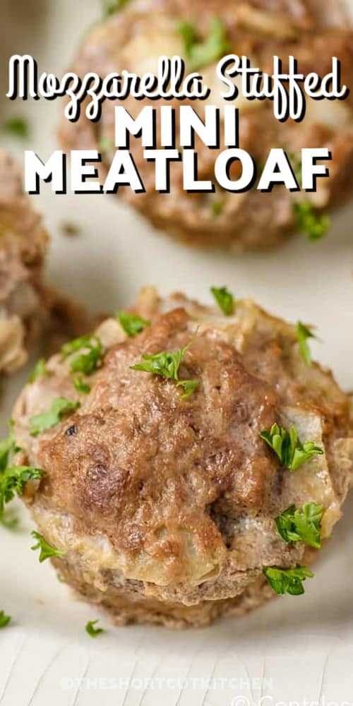 Mozzarella Stuffed Mini Meatloaf on a plate with a title