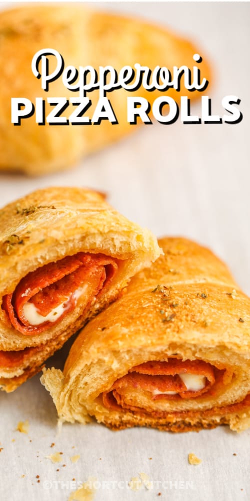 A baked pepperoni pizza roll sliced in half with a title