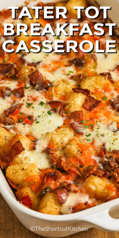 Tater Tot Breakfast Casserole in a white casserole dish with a title