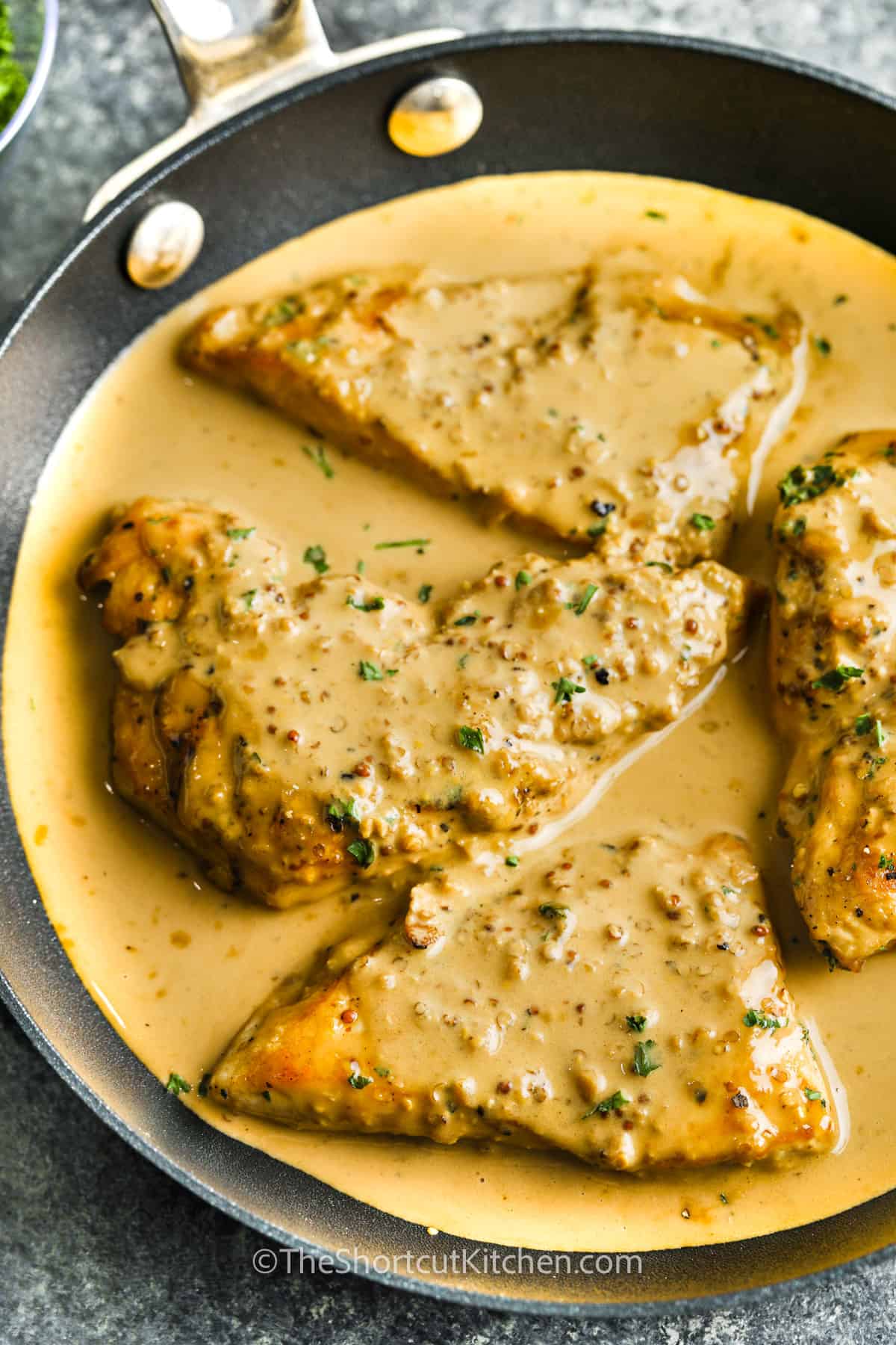 cooked Creamy Chicken Dijon in the pan
