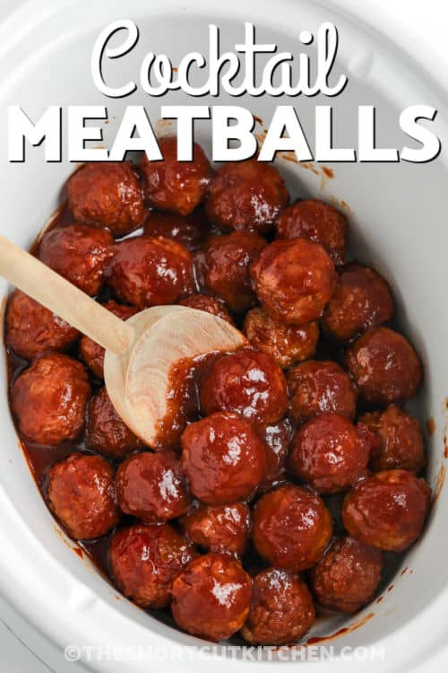 Crock Pot Jelly Meatballs cooked in the crock pot with a title