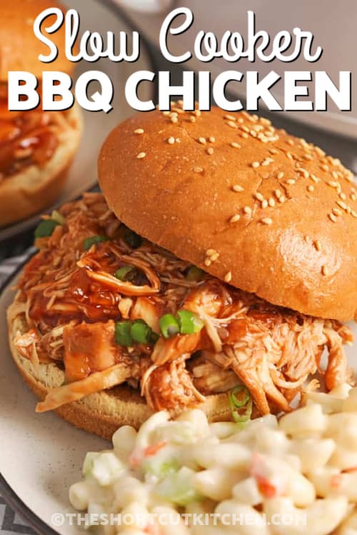 Slow Cooker BBQ Chicken Sandwich on a plate with a title