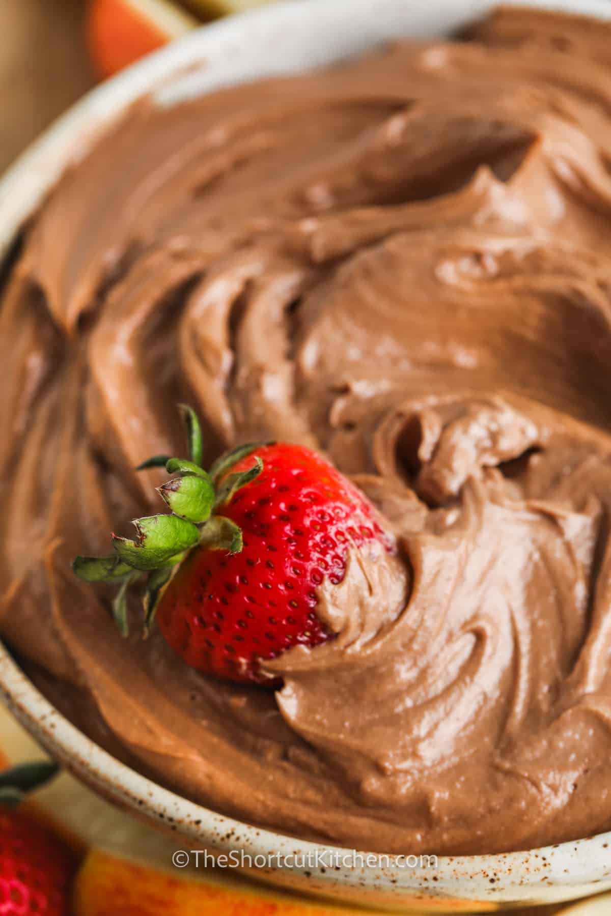 Nutella Fruit Dip with a strawberry