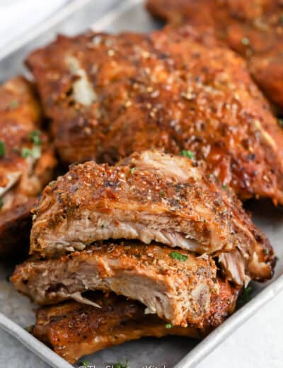 sliced oven baked ribs on a tray