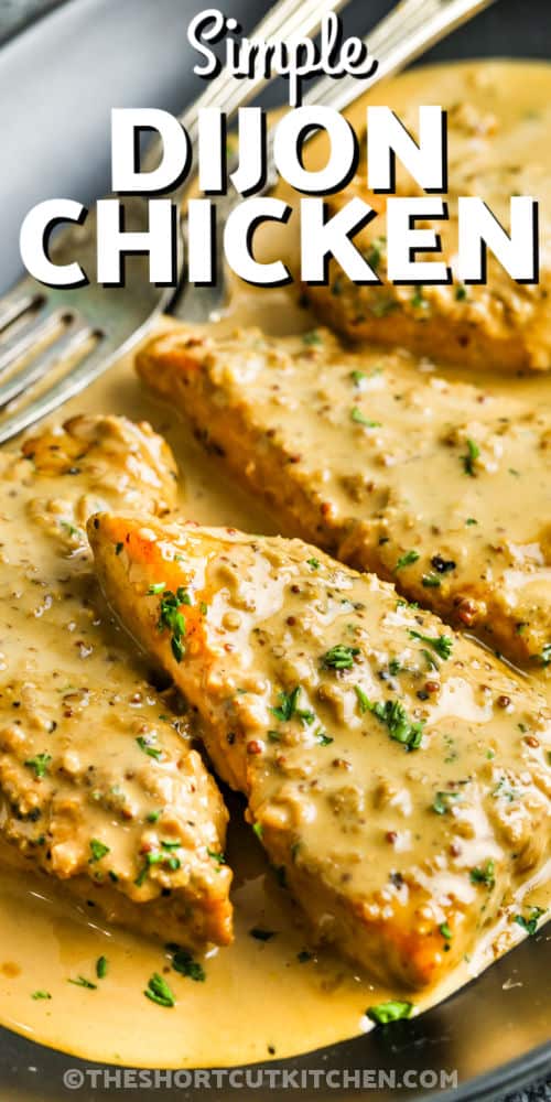 cooked Creamy Chicken Dijon on a plate with a title