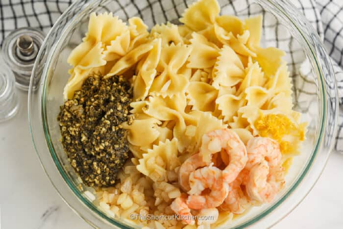 ingredients in a bowl to make Shrimp Pesto Pasta