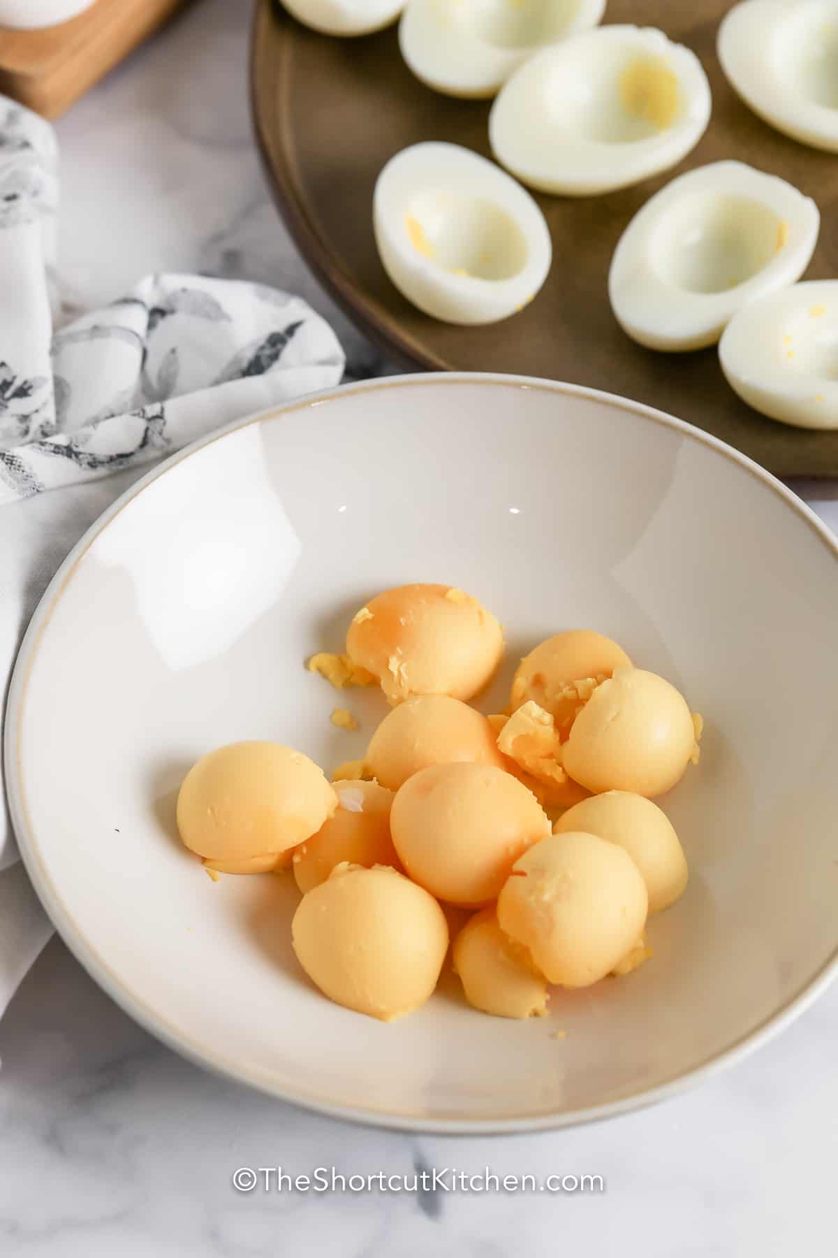 cooked egg yolks in a bowl