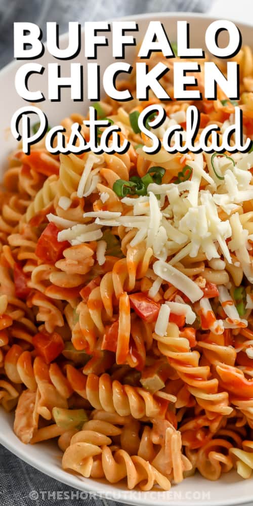 Buffalo Chicken Pasta Salad in a white serving bowl, with a title