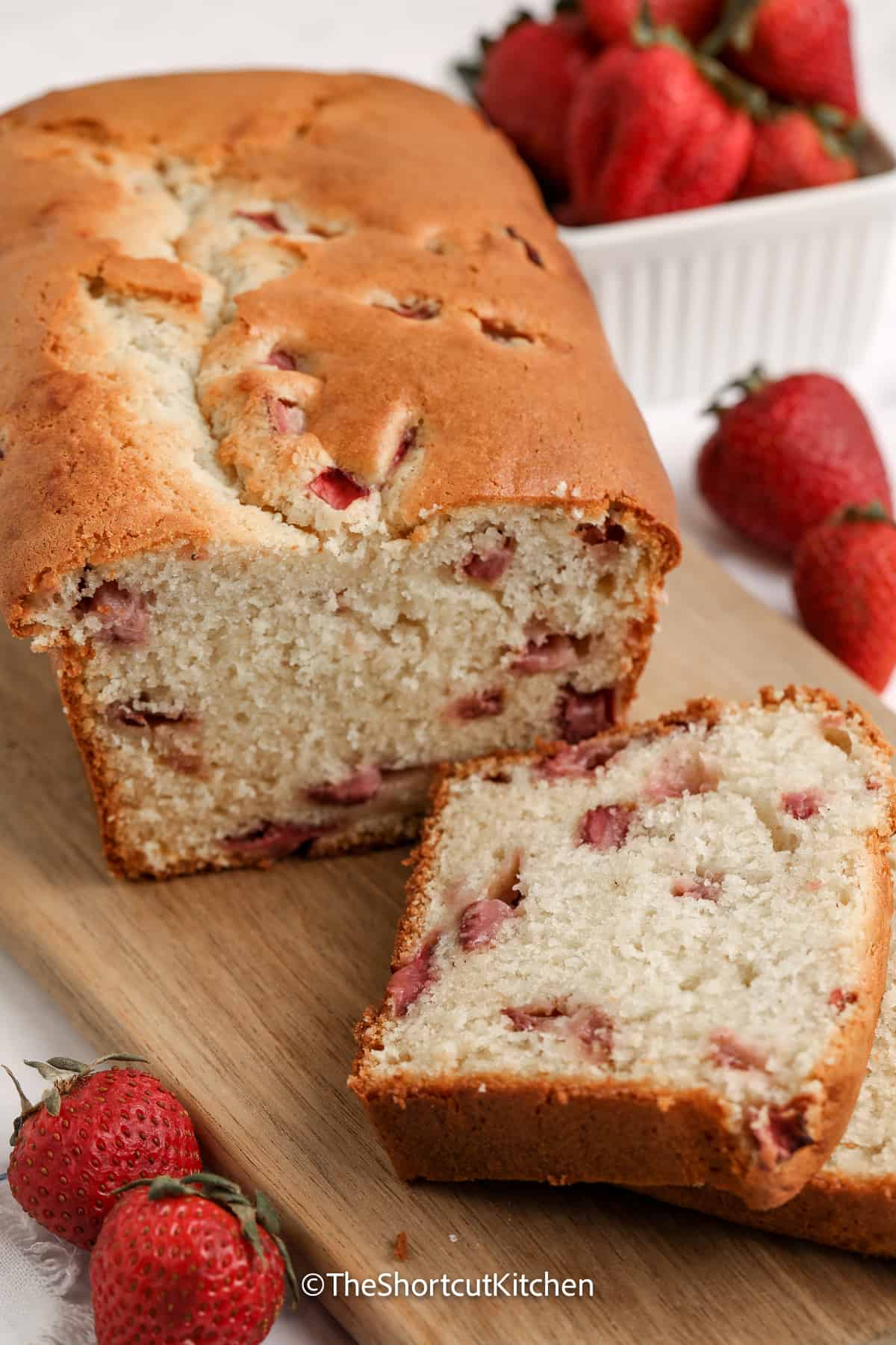 sliced strawberry cream cheese cake